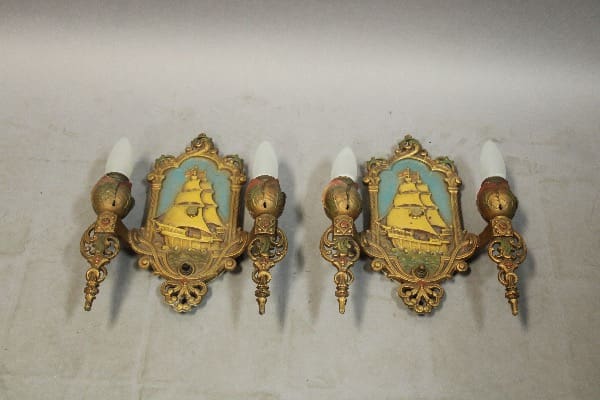 Vintage wall sconces with ship design.