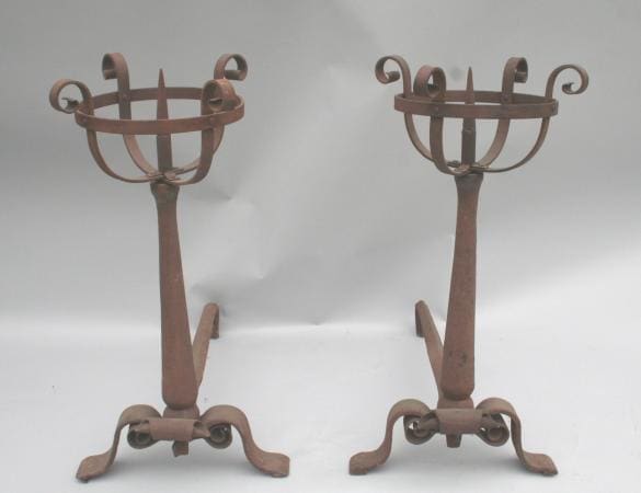Two 247. Pair of Large 1920's Wrought Iron Andirons with scroll designs on a gray background.