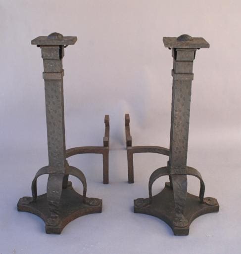 Two 4566. Pair of Heavy Wrought Iron Andirons with raised bases and decorative tops, positioned symmetrically on a neutral backdrop.