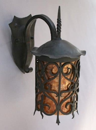 Decorative wall lantern with metal design.