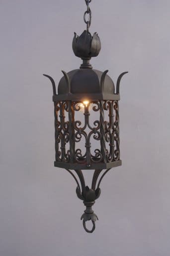 Decorative hanging lantern with intricate design.
