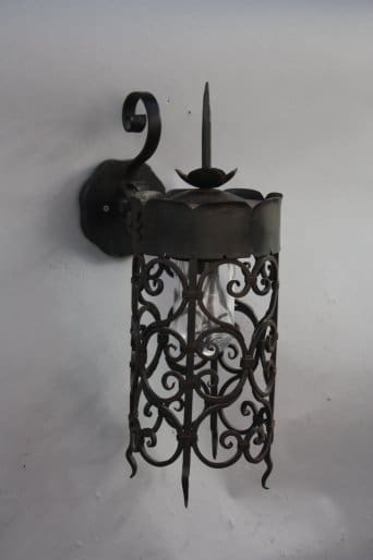 Decorative wrought iron wall lantern.