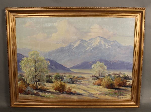 Painting of a mountain range with trees.