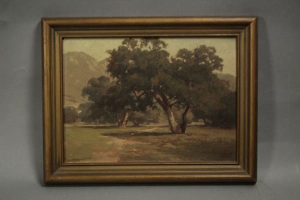 Framed painting of a landscape with trees