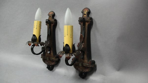 Vintage wall sconces with candle-like bulbs.