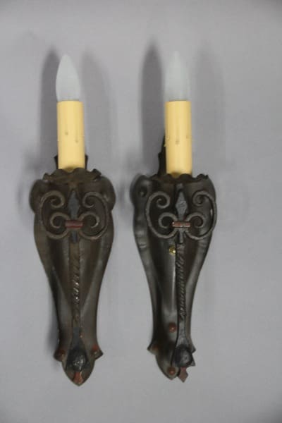 Wall sconces with candle-like bulbs.