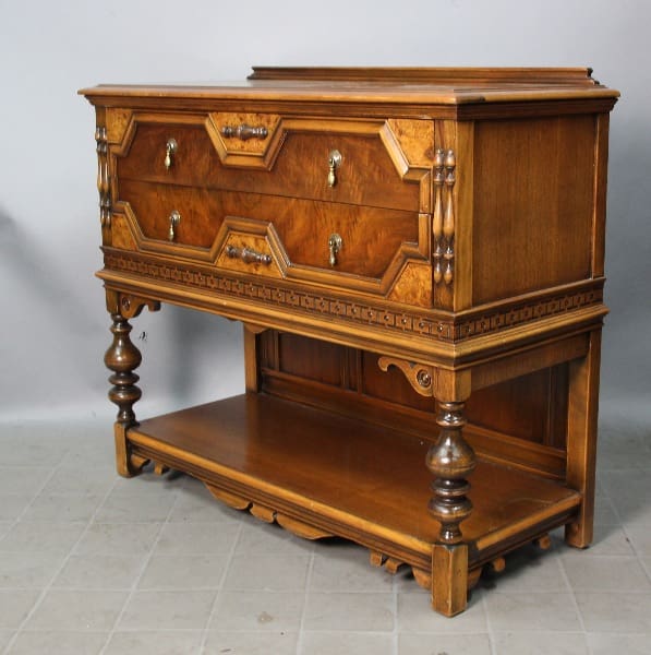 Antique wooden cabinet with two drawers.