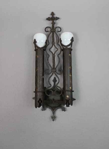 Vintage wall sconce with two lights.