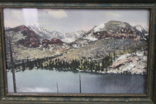 Mountain landscape with lake and forest.