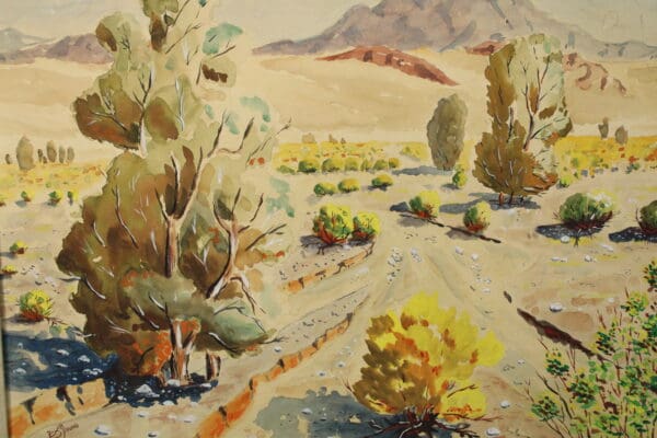 Desert landscape with bushes and trees.