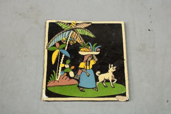 Woman and dog under palm trees.