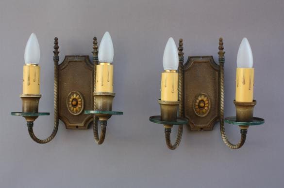 Decorative wall sconces with candle-like bulbs.