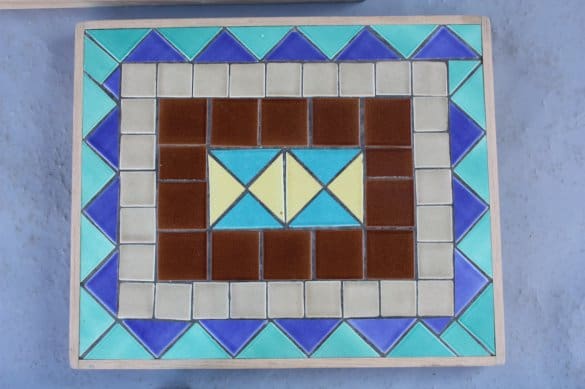 Colorful tiled pattern with geometric shapes.