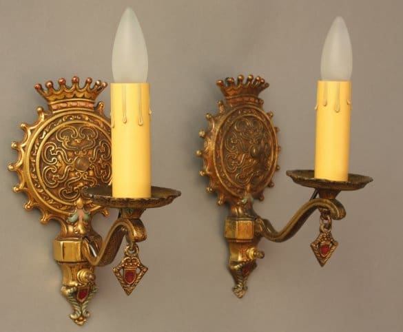 Vintage wall sconces with candle-like bulbs.