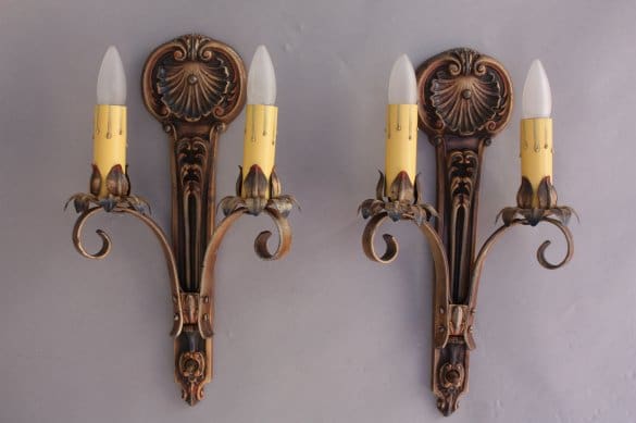 Vintage wall sconces with candle-like bulbs.