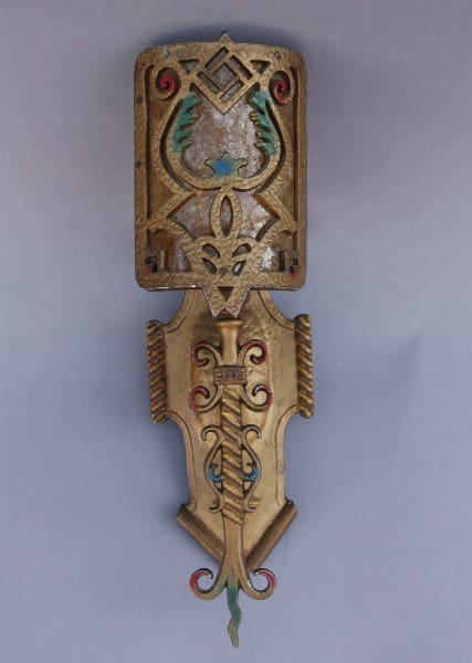 Decorative art piece with intricate designs.