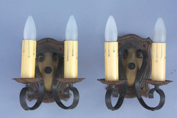 Wall sconces with candle-like bulbs.