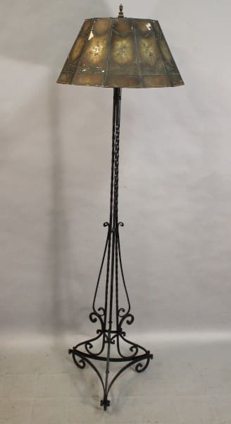 Vintage wrought iron floor lamp with shade.