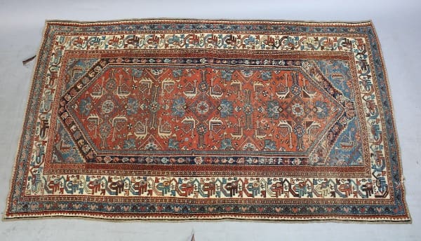 Colorful patterned rug with intricate geometric designs.