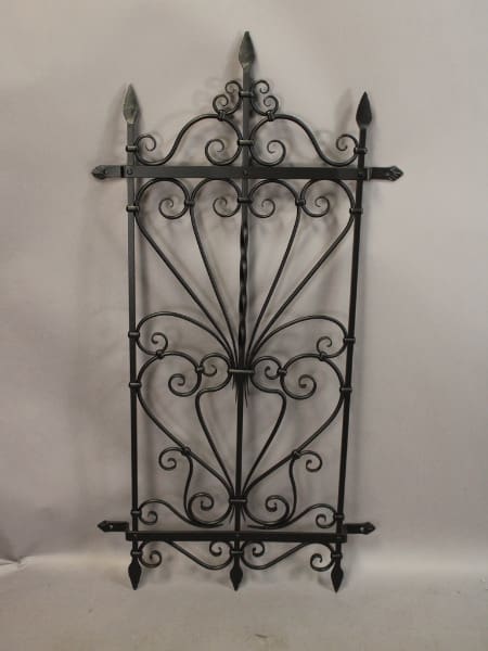 Decorative wrought iron wall panel design.
