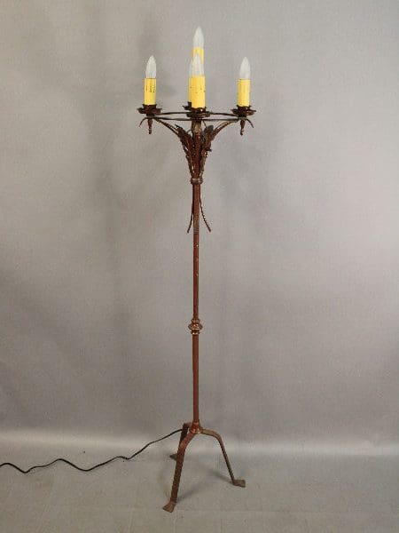 Vintage metal floor lamp with three bulbs.