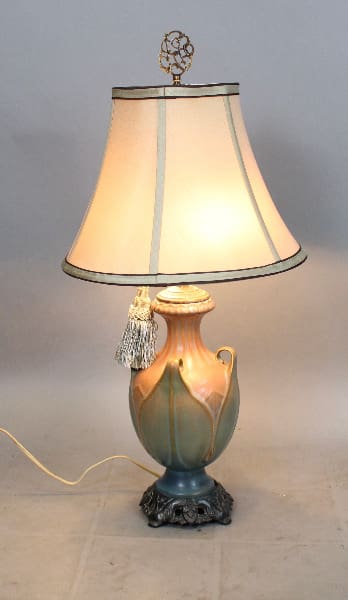 Vintage table lamp with decorative tassel.