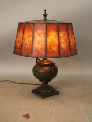 Vintage lamp with stained glass shade.