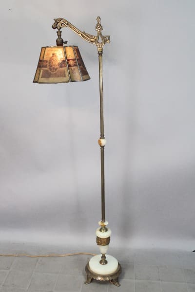 Vintage floor lamp with decorative lampshade.