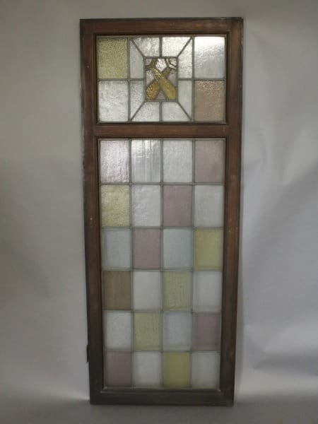 Stained glass window with geometric pattern.