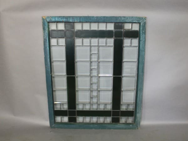 Stained glass window with geometric pattern.