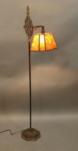 Vintage floor lamp with ornate design.