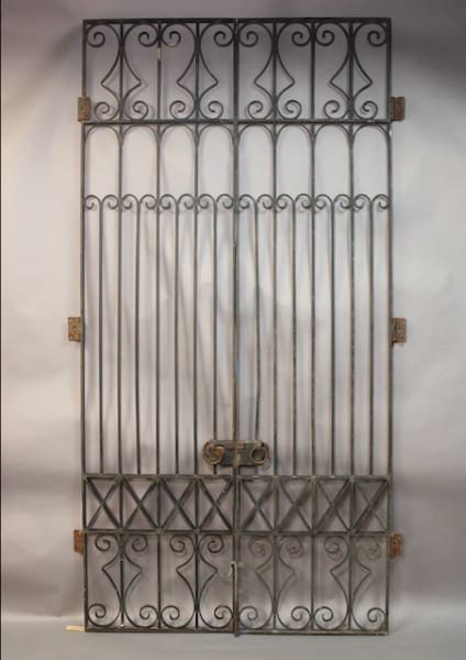 Ornate metal gate with decorative patterns.