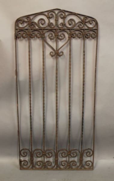 Ornate wrought iron decorative gate panel.