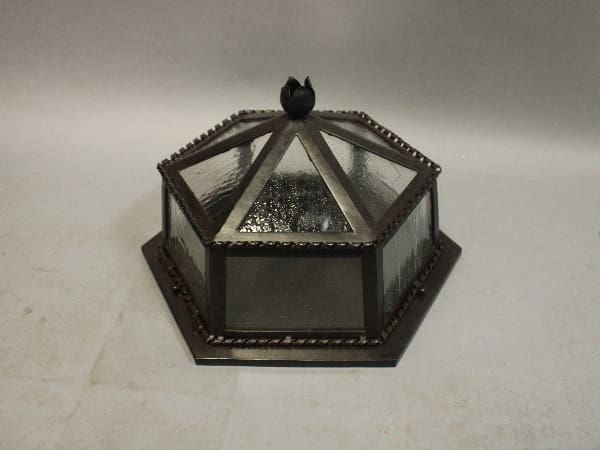 Hexagonal glass and metal decorative display box.