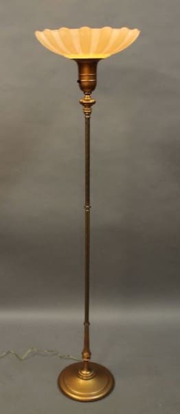 Vintage brass floor lamp with scalloped shade.