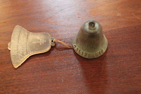 Bronze California bell with metal tag.