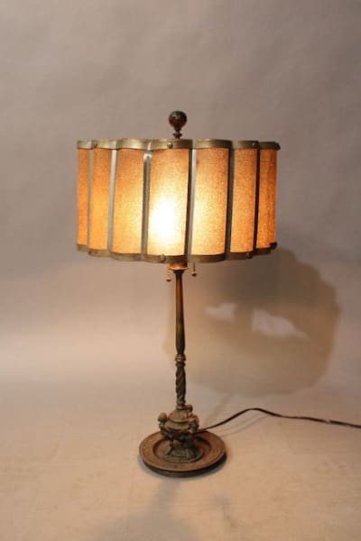 Vintage table lamp with orange shade.