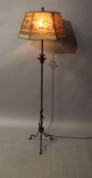 Vintage floor lamp with decorative shade.