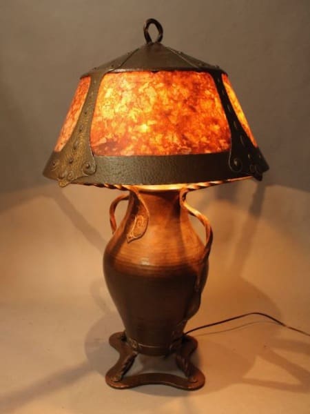 Vintage lamp with decorative stained glass shade.