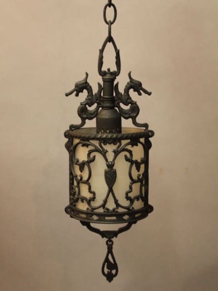 Ornate vintage metal hanging lantern with dragons.