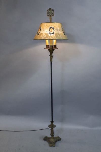 Vintage floor lamp with decorative lampshade.