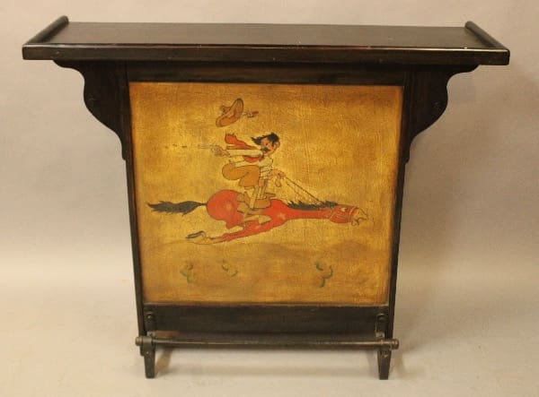 Antique table with painted horse rider scene.