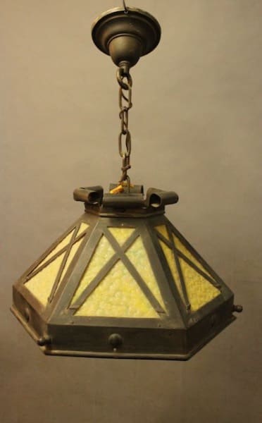Vintage hanging lantern with geometric design.