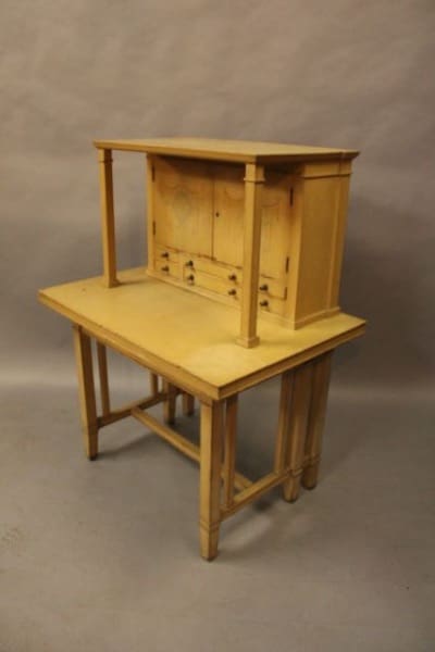 Wooden desk with hutch and drawers.