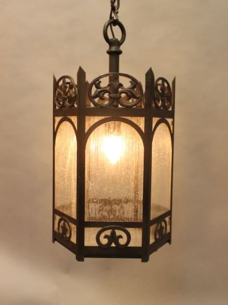 Ornate hanging lantern with glowing light.