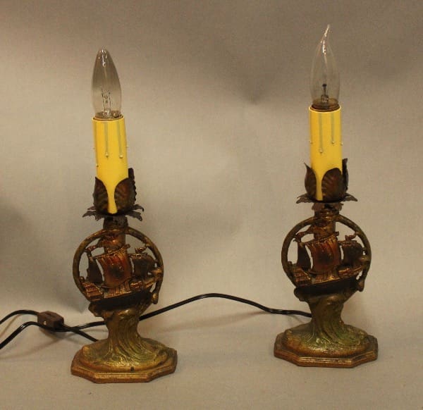 Vintage lamps with ornate bases and bulbs.