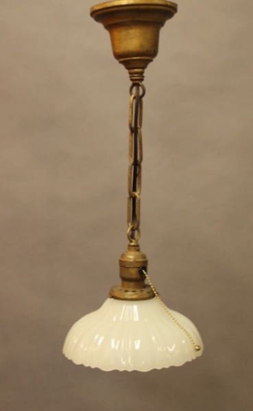 Vintage pendant light with chain pull.