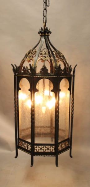 Ornate vintage lantern with glowing lights.