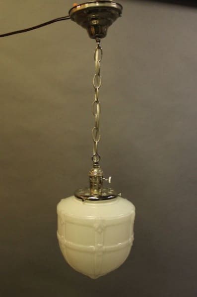 Vintage hanging light fixture with chain.