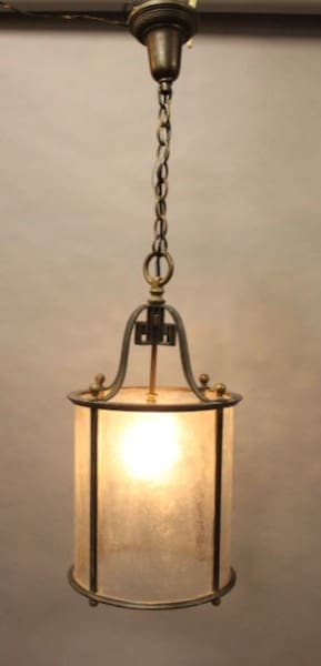 Hanging lantern with warm glowing light.